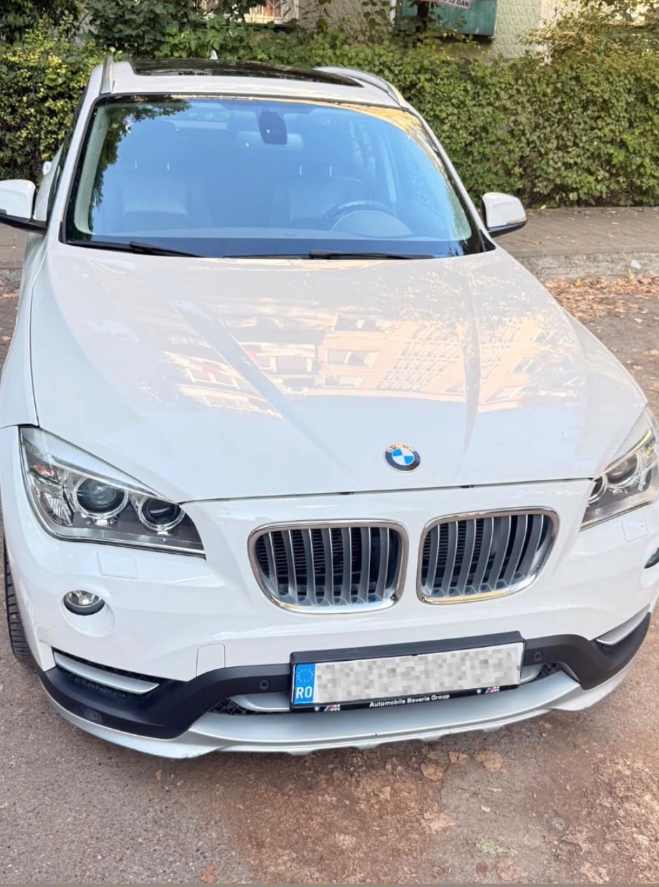 BMW X1 2014 — imagine 13